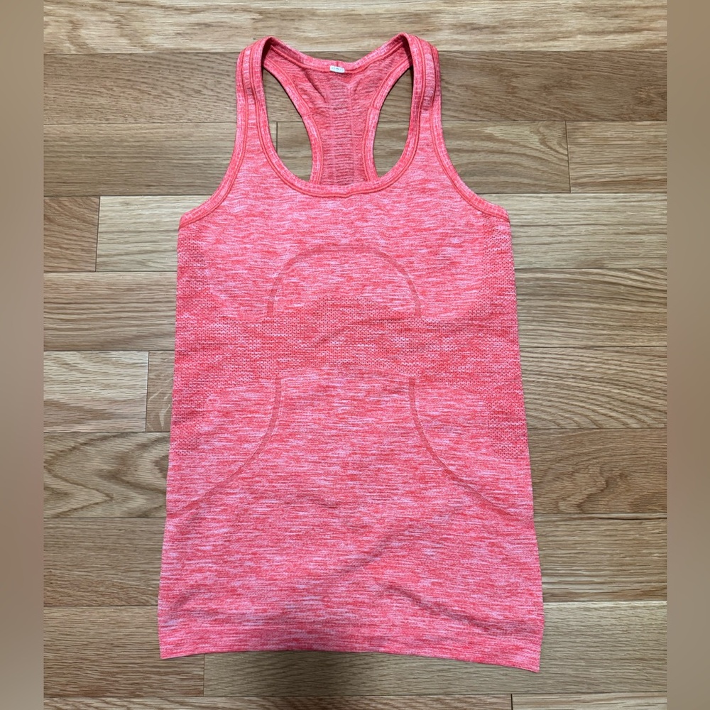 Lululemon Swiftly Tech Racerback Running Tank Top in orange coral color